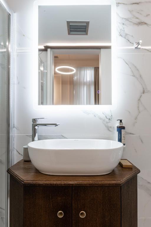 Postel nebo postele na pokoji v ubytování King Othon Boutique Hotel