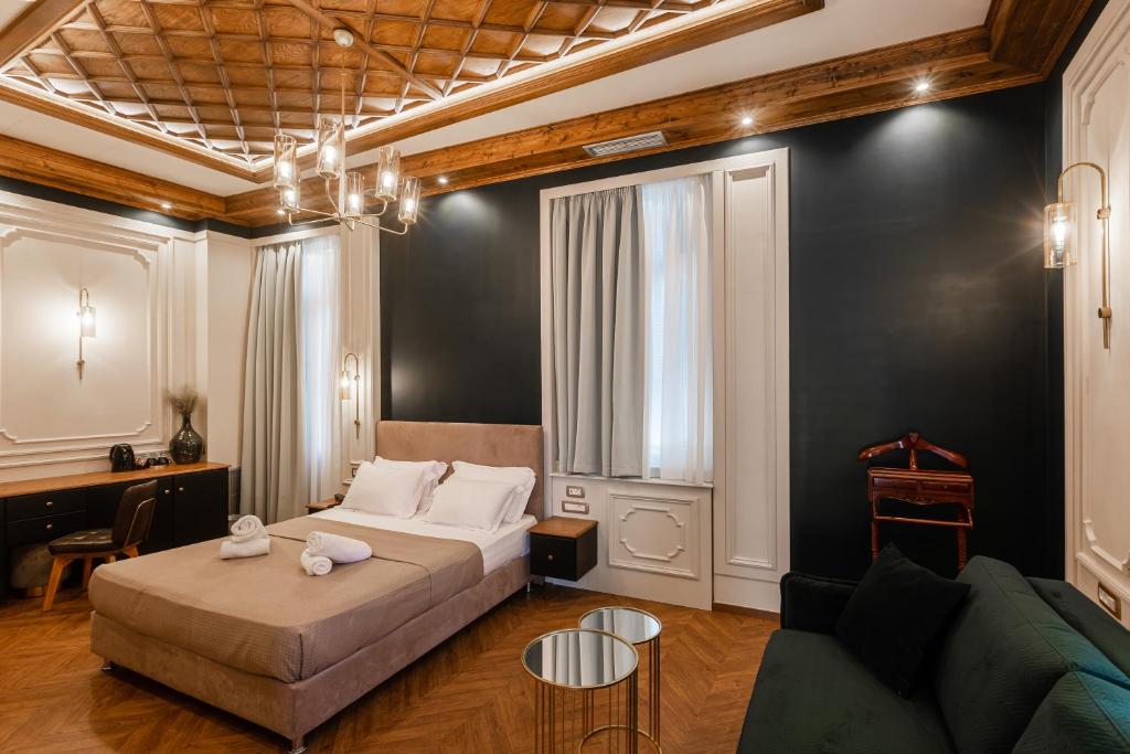 Postel nebo postele na pokoji v ubytování King Othon Boutique Hotel