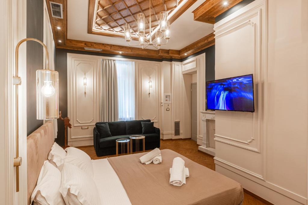 TV a/nebo společenská místnost v ubytování King Othon Boutique Hotel