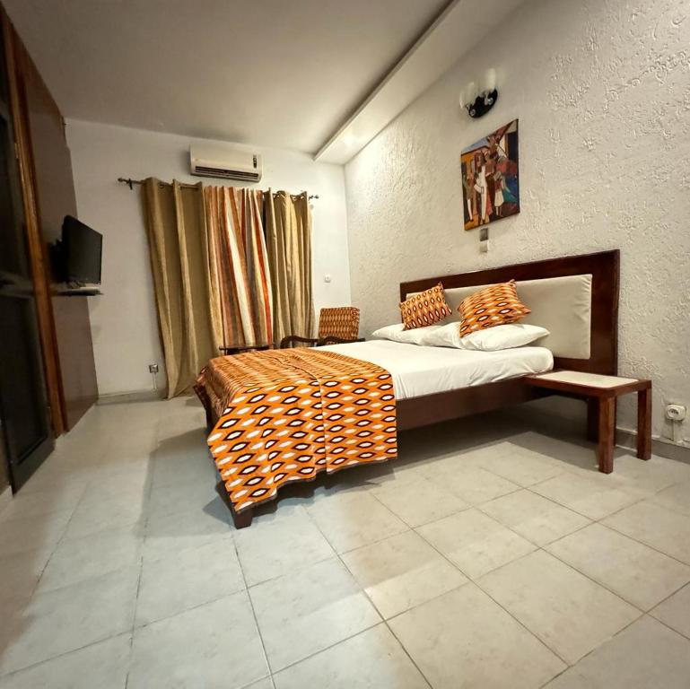 מיטה או מיטות בחדר ב-BAMBOO LODGE - la Criquet 'Event'