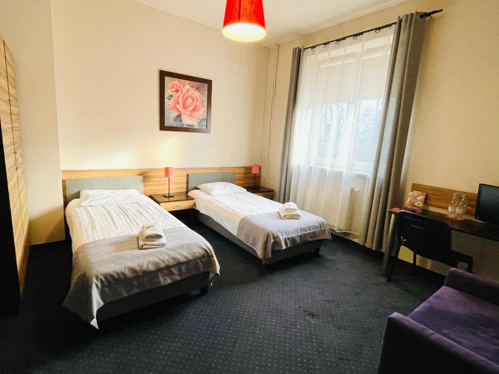 Posteľ alebo postele v izbe v ubytovaní Hotel Seven 7