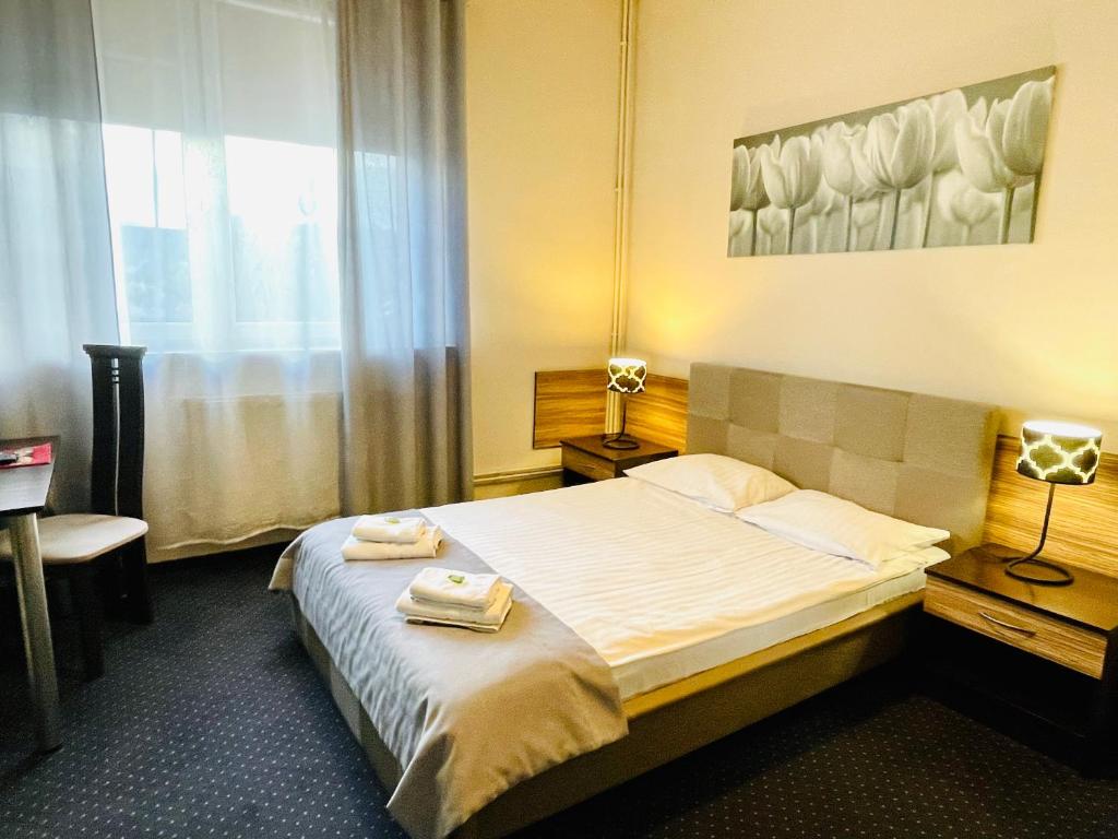 Posteľ alebo postele v izbe v ubytovaní Hotel Seven 7