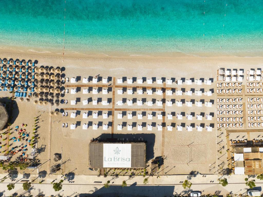 an aerial view of a hotel on the beach at La Brisa Boutique Hotel in Dhërmi