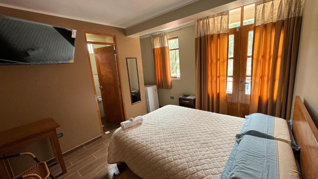 Μια τηλεόραση ή/και κέντρο ψυχαγωγίας στο Hostal Tinkoj