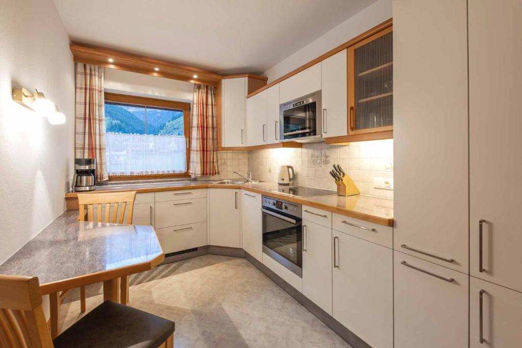 Kuchyň nebo kuchyňský kout v ubytování Landhaus Hofer