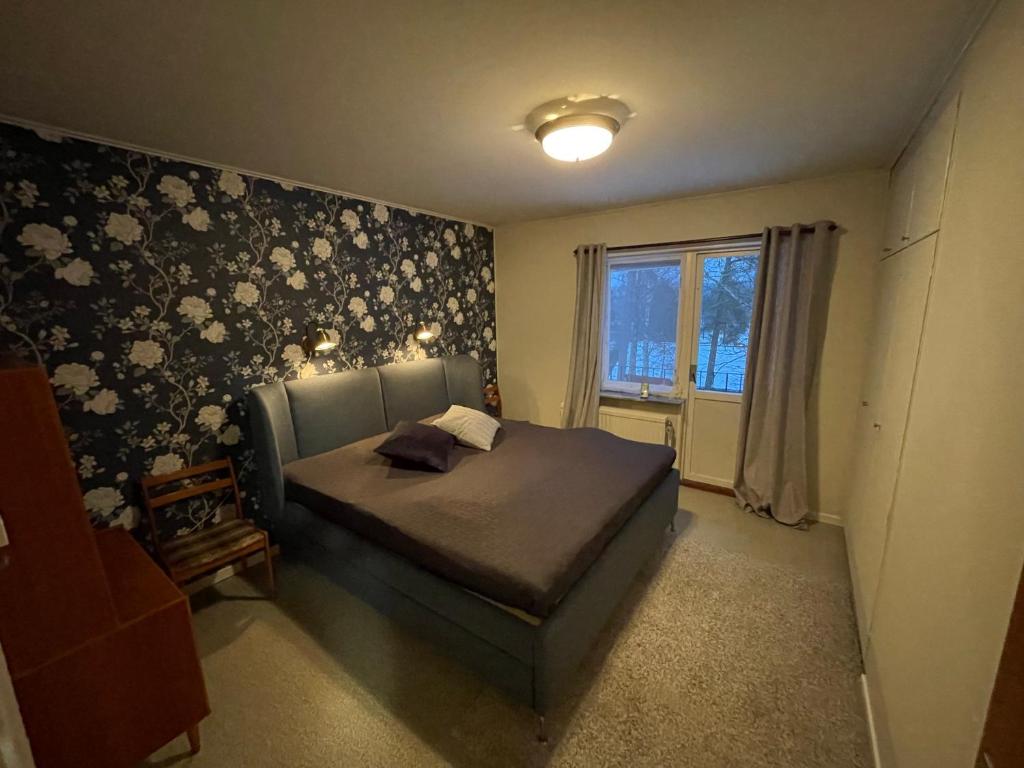 Postel nebo postele na pokoji v ubytování Hestra Guesthouse