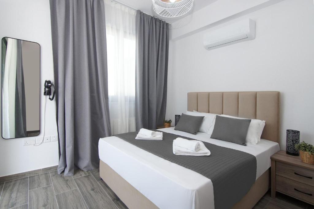 Postel nebo postele na pokoji v ubytování Villa Daniella