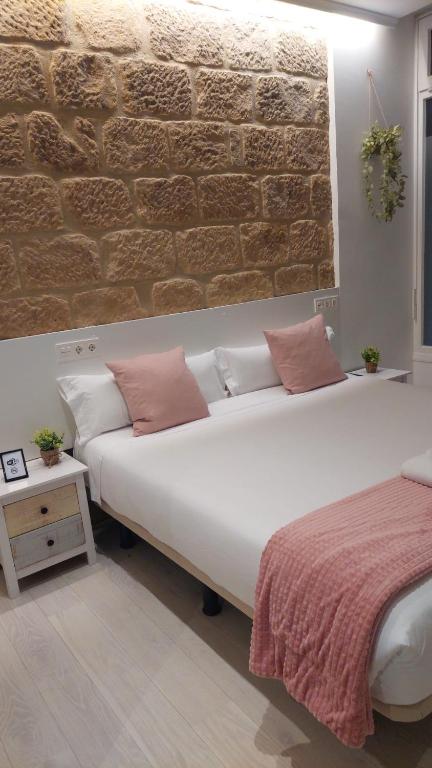 Postel nebo postele na pokoji v ubytování Hotel Norte