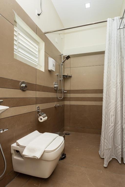 Koupelna v ubytování ESAA Airport Hotel