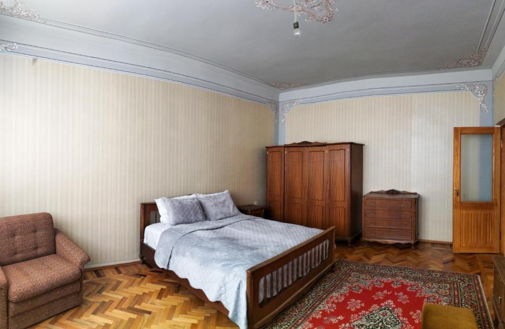 Ένα ή περισσότερα κρεβάτια σε δωμάτιο στο GUEST HOUSE SG