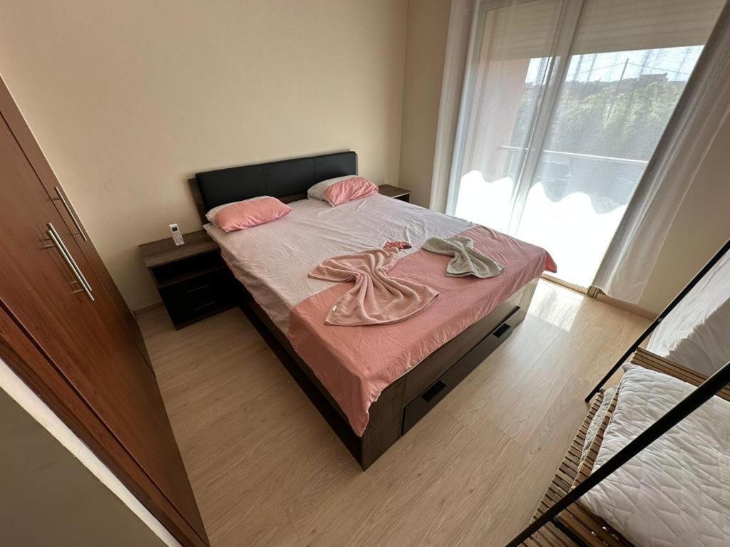 Postel nebo postele na pokoji v ubytování Prestigia appartement de lux