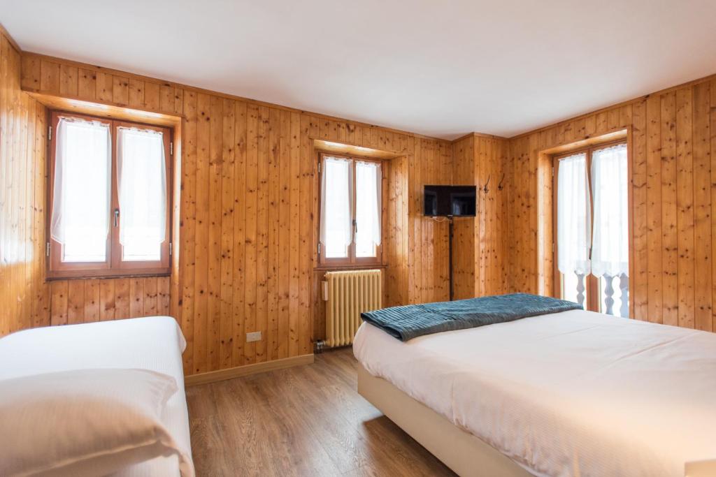 Postel nebo postele na pokoji v ubytování Hotel Signal