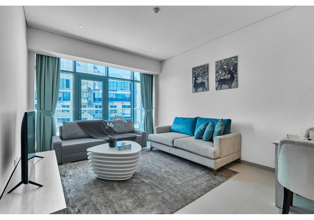Posezení v ubytování First Class Apartments in Seven Palm with direct Access to the West Palm Beach and Nakheel Mall