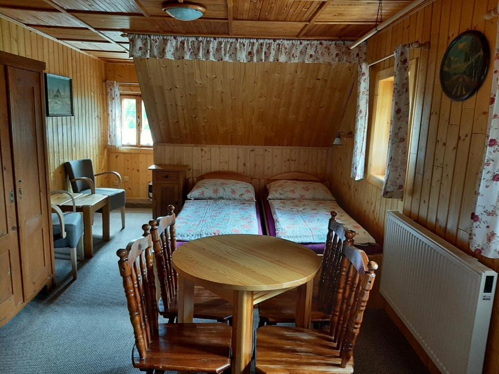 Postel nebo postele na pokoji v ubytování Bouda Na Cestě