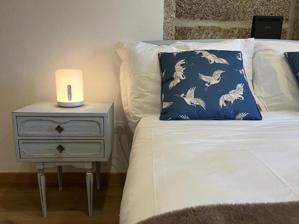Postel nebo postele na pokoji v ubytování Vila Mena by Trip2Portugal