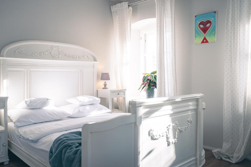 Postel nebo postele na pokoji v ubytování Turkusowa Wyspa