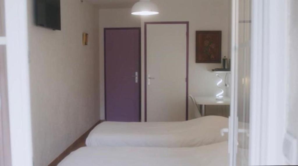 Postel nebo postele na pokoji v ubytování Chambres et Table d'hôtes Cerviña
