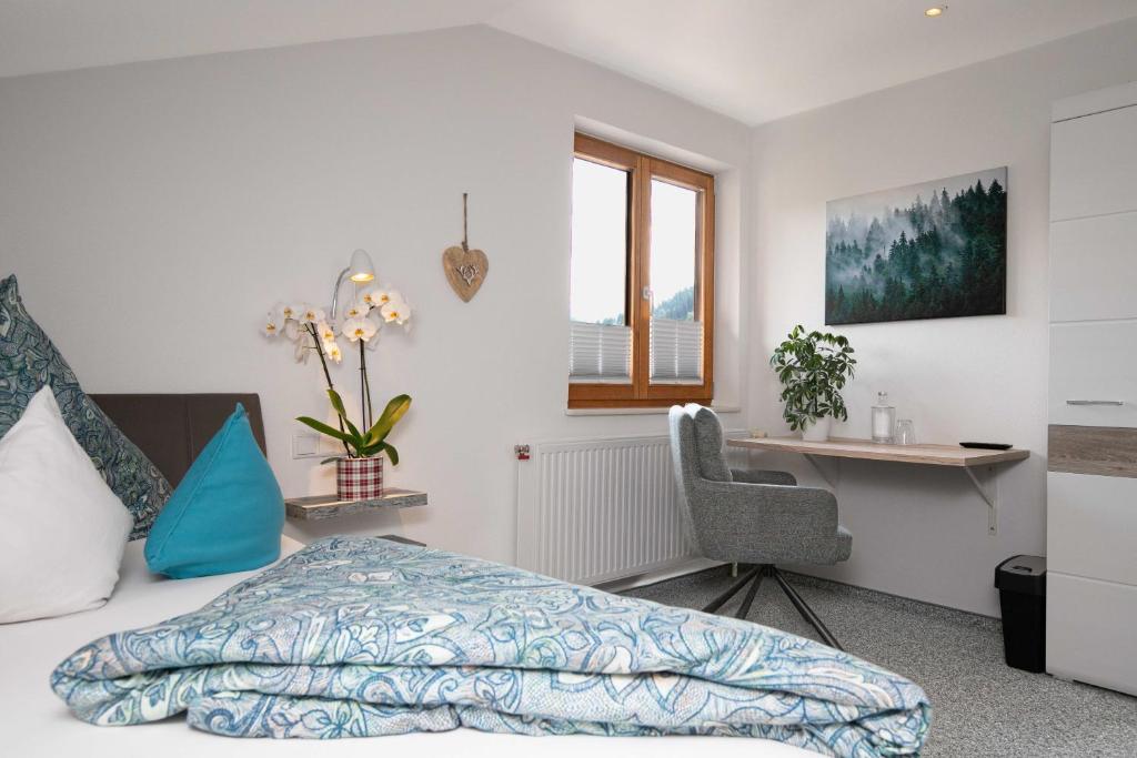 Postel nebo postele na pokoji v ubytování Hotel Restaurant Amadeus - inclusive Skipass und vieles mehr