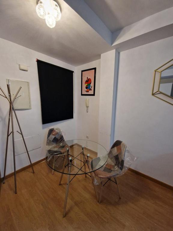 Televízia a/alebo spoločenská miestnosť v ubytovaní Castilla del Patrocinio, Coqueto apartamento de 1Dormitorio