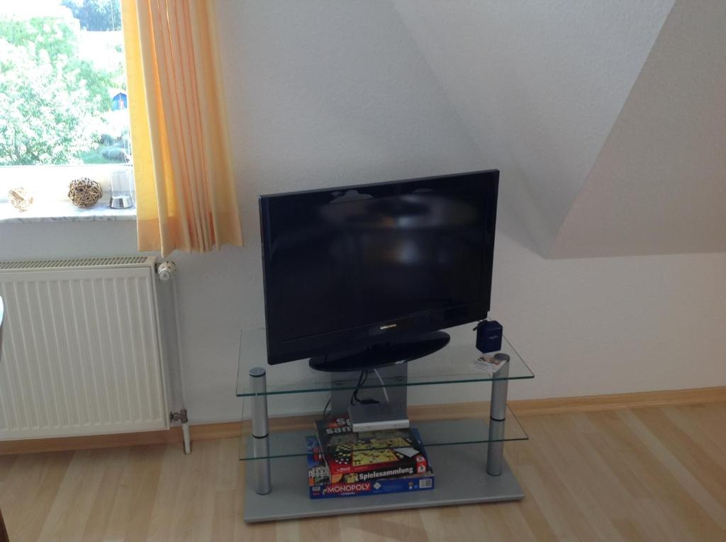 TV a/nebo společenská místnost v ubytování Fewo Zur Ilmenau