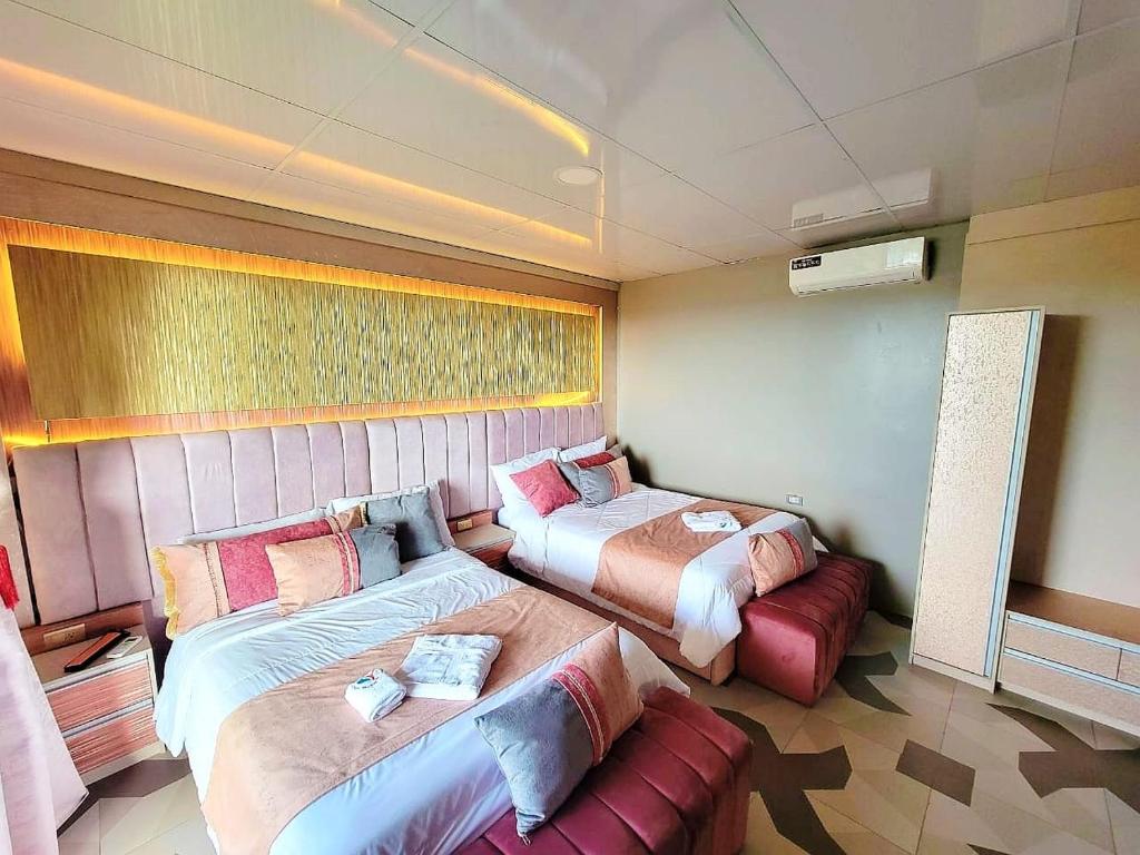 Postel nebo postele na pokoji v ubytování Hostal Gosén