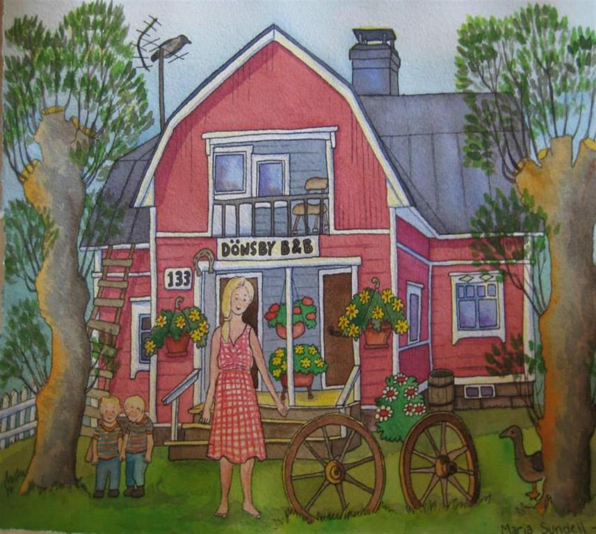 een schilderij van een vrouw die voor een rood huis staat bij Villa Dönsby in Karjaa