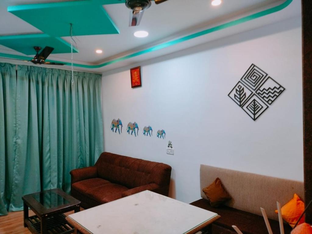 Posezení v ubytování Ronne's 2Bhk vacation rental near Baga Beach