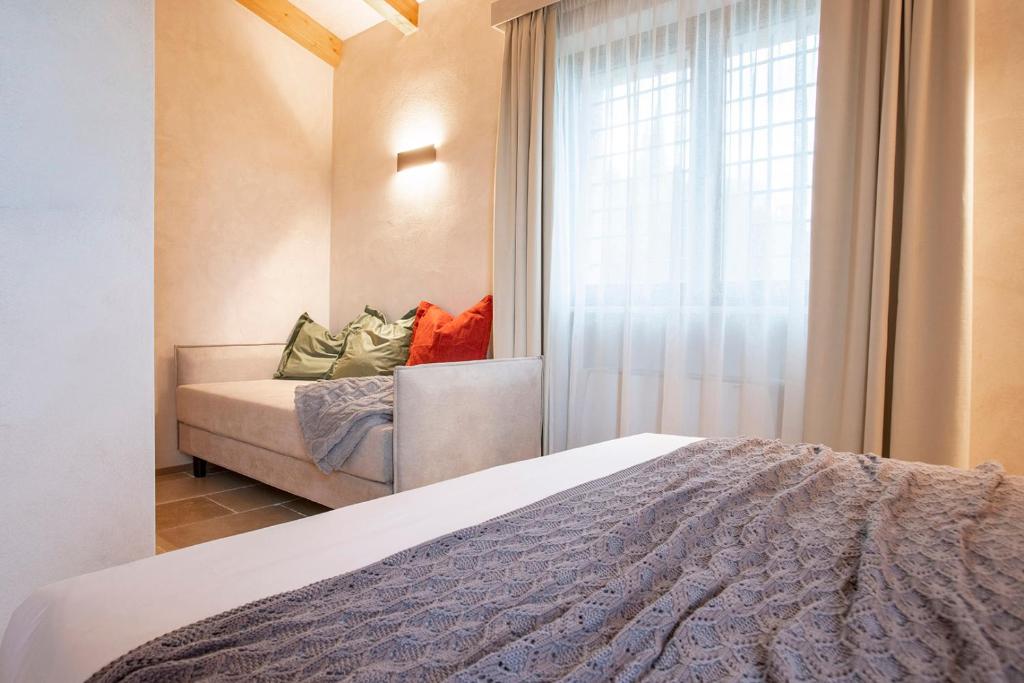 Postel nebo postele na pokoji v ubytování Borgo Vinceri