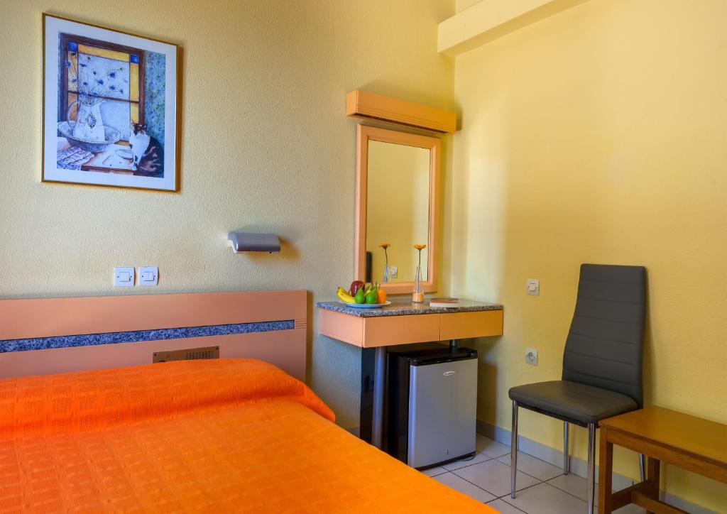 Llit o llits en una habitació de Park Hotel