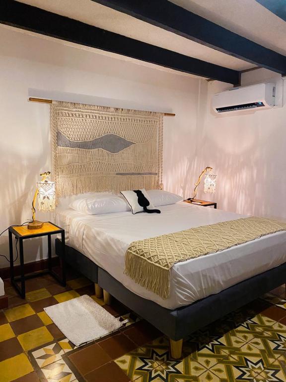 Postel nebo postele na pokoji v ubytování Hostal Patio del Río