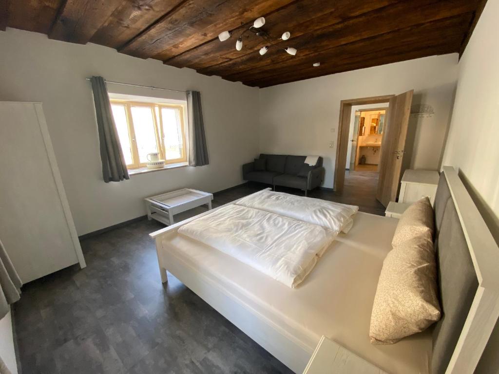 Кровать или кровати в номере Stoffelbauer