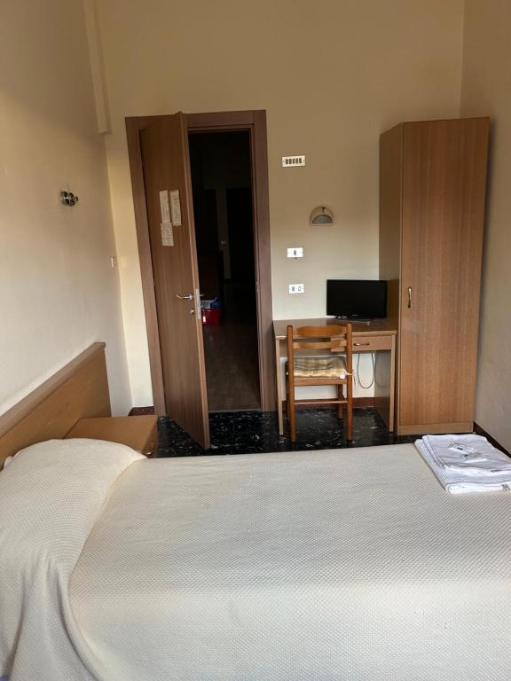Postel nebo postele na pokoji v ubytování Albergo pensione Bianco