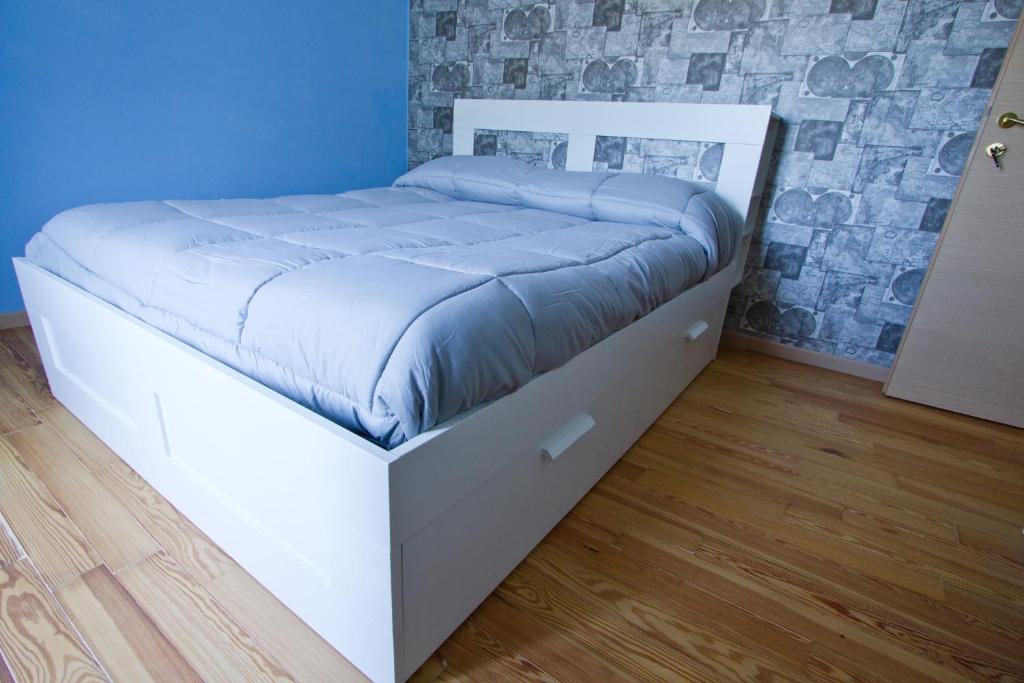 Postel nebo postele na pokoji v ubytování B&B Casa Arcangeli