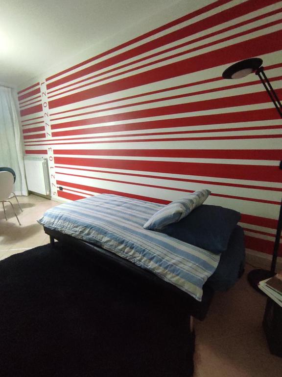 Postel nebo postele na pokoji v ubytování Appartamento tranquillo BARCODE HOUSE