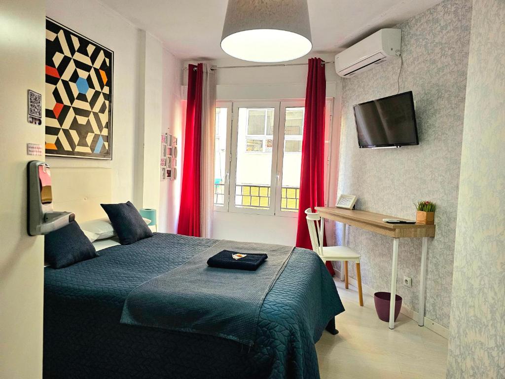 Postel nebo postele na pokoji v ubytování Centric Rooms Mercado