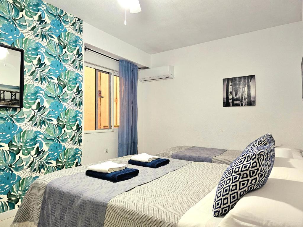 Postel nebo postele na pokoji v ubytování Centric Rooms Mercado