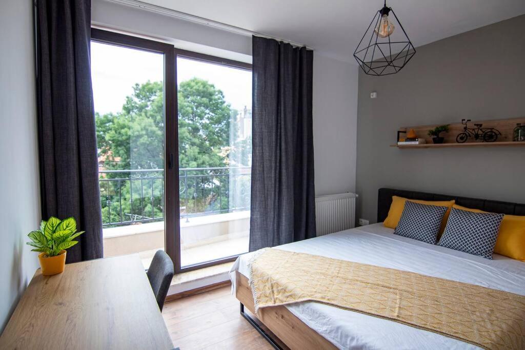 Postel nebo postele na pokoji v ubytování Apartment with private parking 1