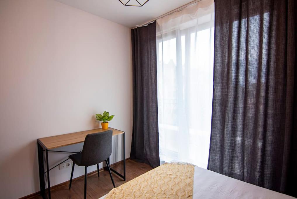 Postel nebo postele na pokoji v ubytování Apartment with private parking 1
