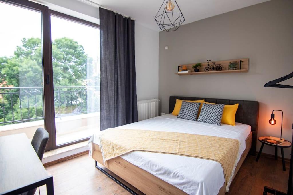 Postel nebo postele na pokoji v ubytování Apartment with private parking 1