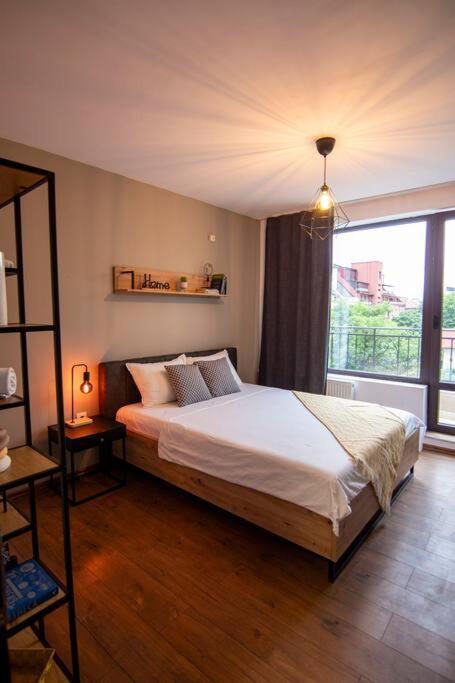 Postel nebo postele na pokoji v ubytování Apartment with private parking 1