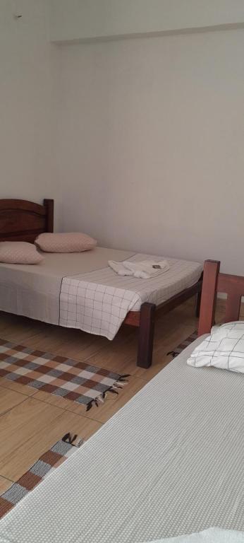 Postel nebo postele na pokoji v ubytování Pousada Pé na Areia