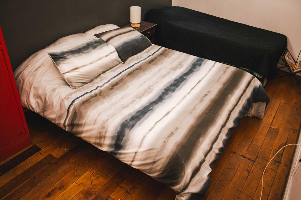 Voodi või voodid majutusasutuse Hostal Salvador toas