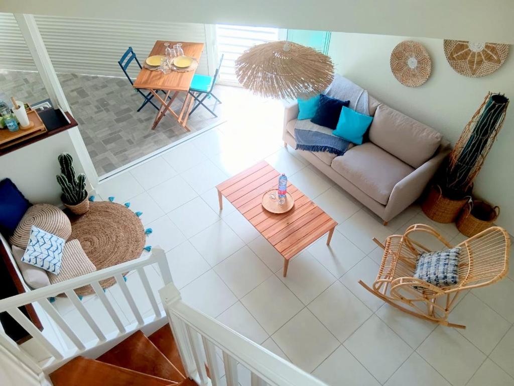 Posezení v ubytování Les Parasols Suite Prestige - Signature RelaXMooD