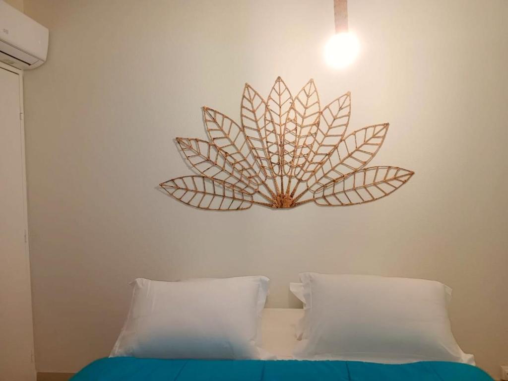 Postel nebo postele na pokoji v ubytování Les Parasols Suite Prestige - Signature RelaXMooD