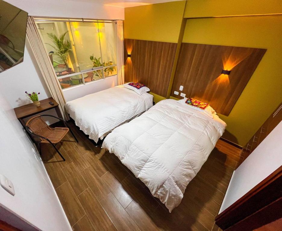 Postel nebo postele na pokoji v ubytování Velvet residence