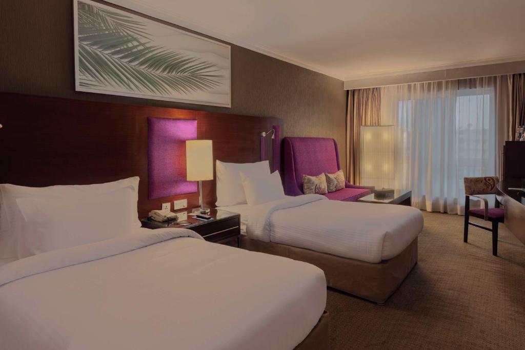 Postel nebo postele na pokoji v ubytování Radisson Blu Hotel, Cairo Heliopolis
