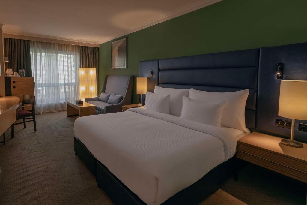 Postel nebo postele na pokoji v ubytování Radisson Blu Hotel, Cairo Heliopolis