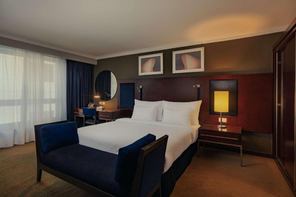 Postel nebo postele na pokoji v ubytování Radisson Blu Hotel, Cairo Heliopolis