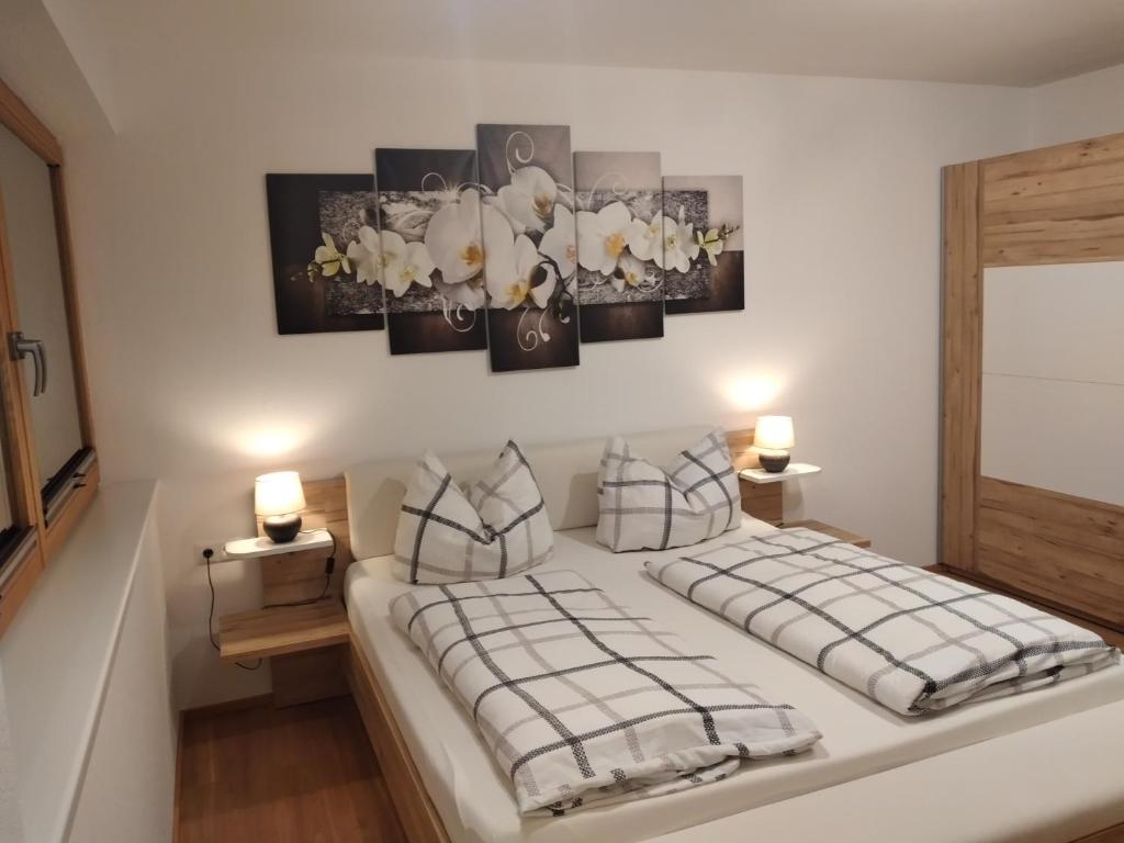 Postel nebo postele na pokoji v ubytování Ferienwohnung Oberkreut