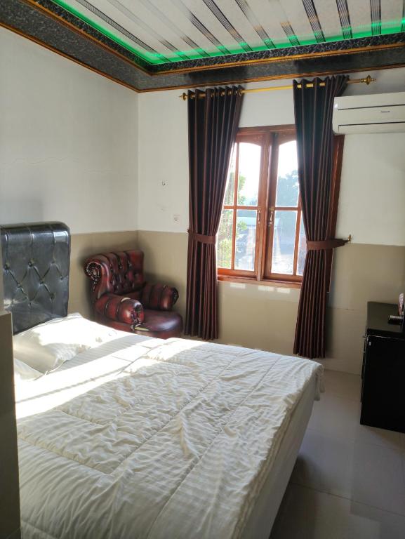 Penginapan Nurmega jaya - Chambre De Luxe